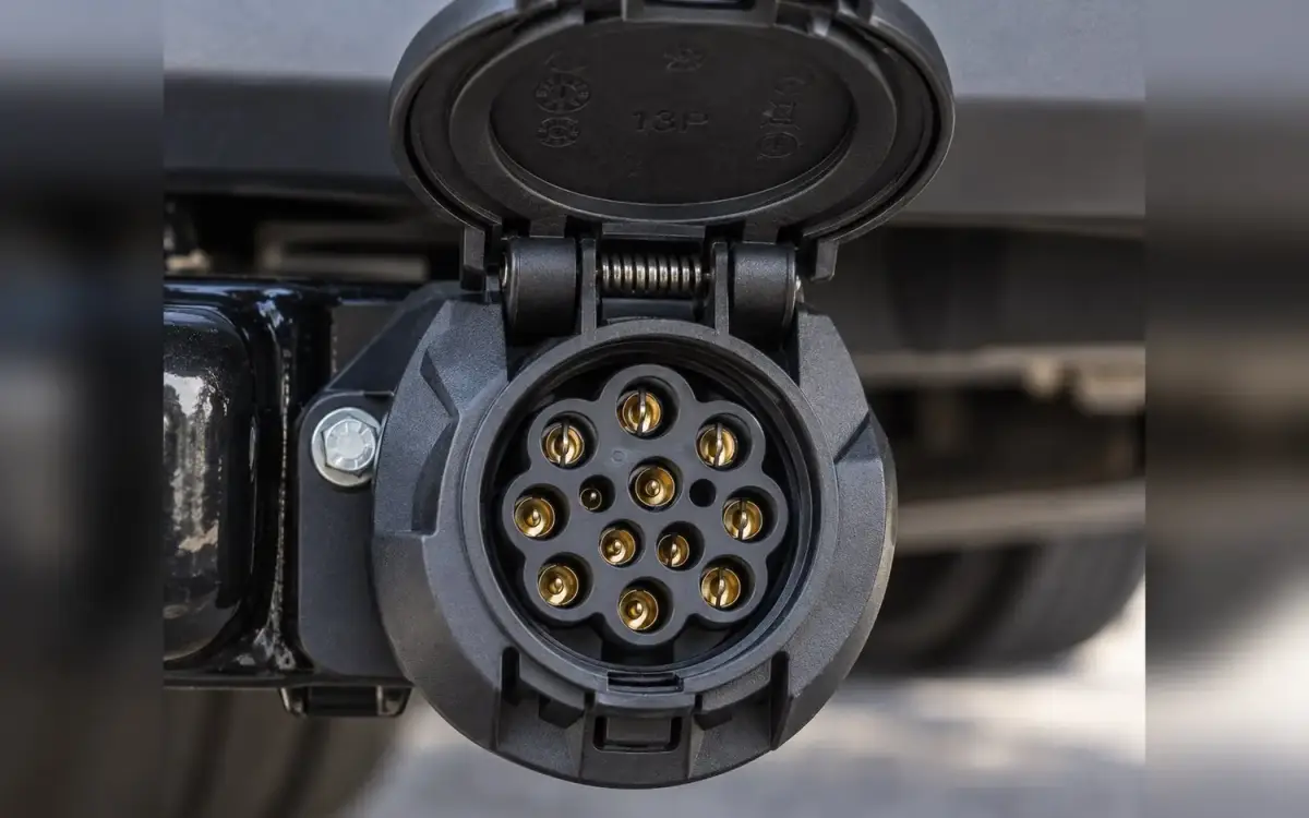 Close-up of a 13-pin towing electrics socket wired in and mounted